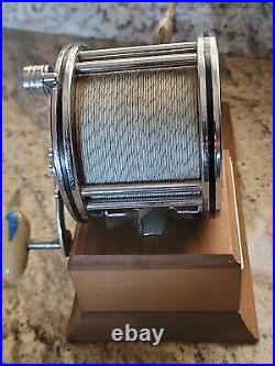 1972 Penn 49 reel Clock Trophy Marine Time Co 1973 Yarn Spinner Award Vowels Inv