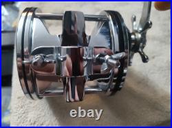 EARLY (PENN) 6/0 SENATOR with BLACK SIDEPLATES & AMBER HANDLE/ SEE PHOTOS