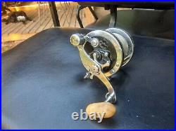 Early Penn Long Beach Deluxe with waffle clicker vintage fishing reel antique