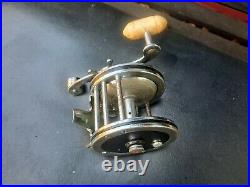 Early Penn Long Beach Deluxe with waffle clicker vintage fishing reel antique