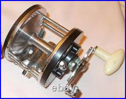 Fishing reels Penn 85, and Ocean City 112, both preowned vintage