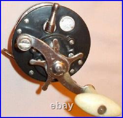 Fishing reels Penn 85, and Ocean City 112, both preowned vintage