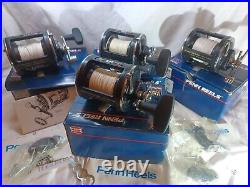 LOT OF 4 VERY CLEAN PENN 320 GTI LEVELWIND REELS WithROD CLAMPS MADE IN USA WithBox
