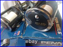 LOT OF 4 VERY CLEAN PENN 320 GTI LEVELWIND REELS WithROD CLAMPS MADE IN USA WithBox