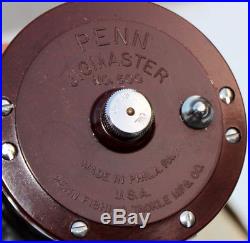 NOS Vintage Penn JigMaster 500 Reel MINT in ORIGINAL BOX PAPERS rod clamp & tool