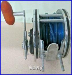 Penn 349 salt water fishing reel, collectible vintage wood handled USA made