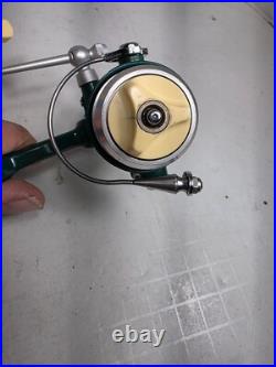Penn 716 ultra light spinning reel made in U. S. A. With box and extras