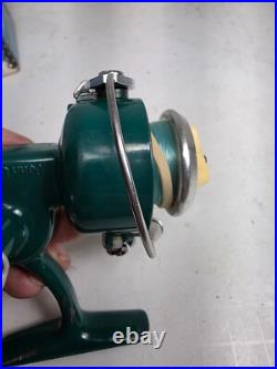 Penn 716 ultra light spinning reel made in U. S. A. With box and extras
