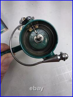 Penn 716 ultra light spinning reel made in U. S. A. With box and extras