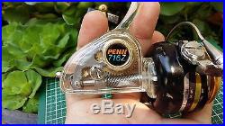 Penn 716z spinning reel with clear housing and side plate