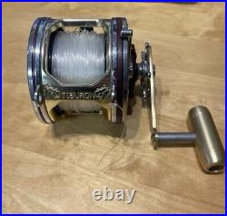 Penn Senator 114H With Clamp, Gold Tiburon Frame, And Machined Brass Handle