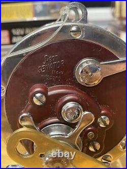 Penn Senator 114H With Clamp, Gold Tiburon Frame, And Machined Brass Handle