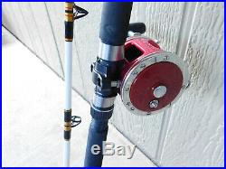 Penn Slammer Deep Sea Fishing Rod 113H Tiburon Special 4/0 Senator Chrome on Red