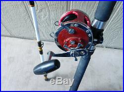 Penn Slammer Deep Sea Fishing Rod 113H Tiburon Special 4/0 Senator Chrome on Red