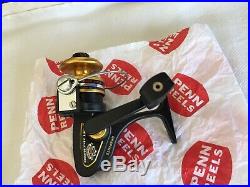 VTG PENN 4300SS SPINNING REEL Lightly Used WITH BOX AND ALL PAPERWORK MINT