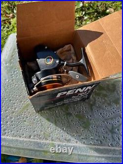 VintageNEW OLD STOCK' PENN 704z Surf Spinning Reel and its box, made in USA