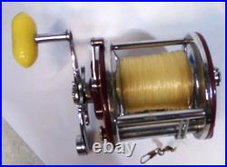 Vintage Penn 209MF PEER Monofil Level Wind Yellow Handle with original box