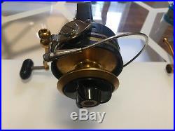 Vintage Penn 710z Spinning Fishing Reel Comes With 2 Handles