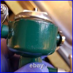 Vintage Penn 716 ultra light spinning reel. Green finish. Ex condition