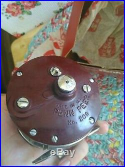 Vintage Penn Fishing Reel 209 mf. With box and papers