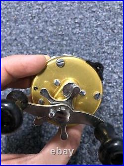 Vintage Penn Levelmatic 940 Baitcasting Fishing Reel Made in USA Gold Clean