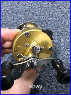 Vintage Penn Levelmatic 940 Baitcasting Fishing Reel Made in USA Gold Clean