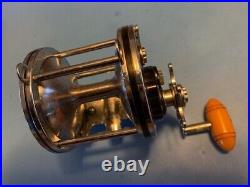 Vintage Penn Senator 114 6/0 Trolling Fishing Reel Hershey Kiss Coin Edge Amber