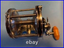 Vintage Penn Senator 114 6/0 Trolling Fishing Reel Hershey Kiss Coin Edge Amber