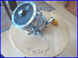 Vintage Penn Senator 114-H 6/0 Salt Water Fishing Reel with Rod Clamp