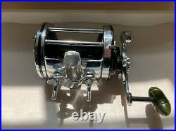Vintage Penn Squidder 140 Fishing Reel With rod Clamp. Made in the USA
